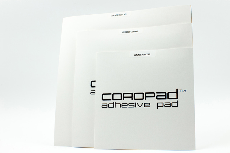 CORO-PACK  - Zestaw trzech podkładek COROPad™, (1) - Podkładki adhezyjne
